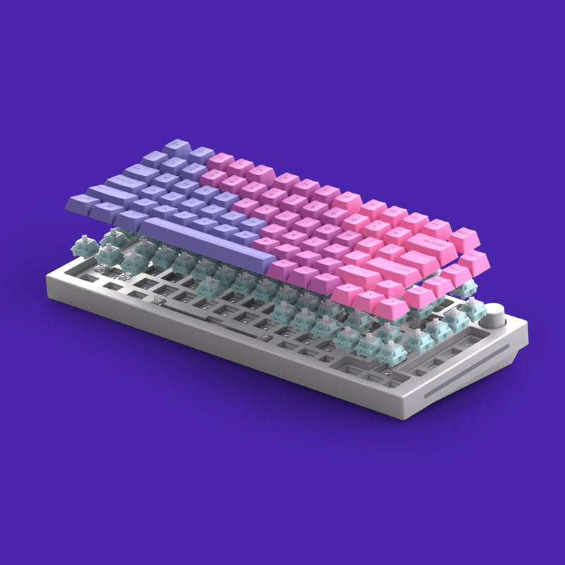 A GMMK PRO Barebones in White Ice with GPBT Nebula Keycaps is shown in an exploded view, revealing Glorious Lynx switches beneath the keys. The background is a vibrant purple.