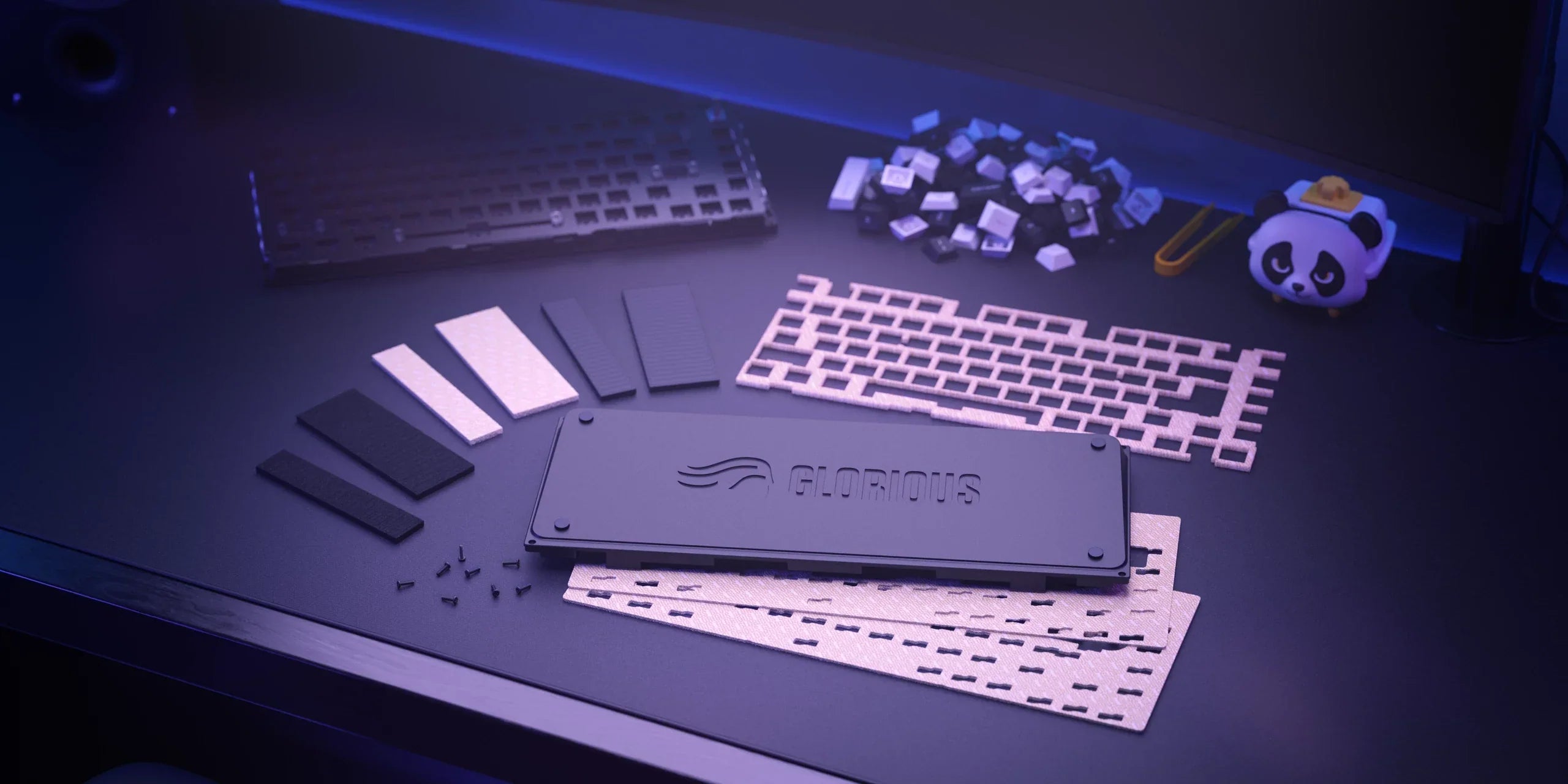 Components of the GMMK PRO FlexKit arranged on a desk