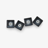 O-Ring Switch Dampeners installed on the underside of black keycaps