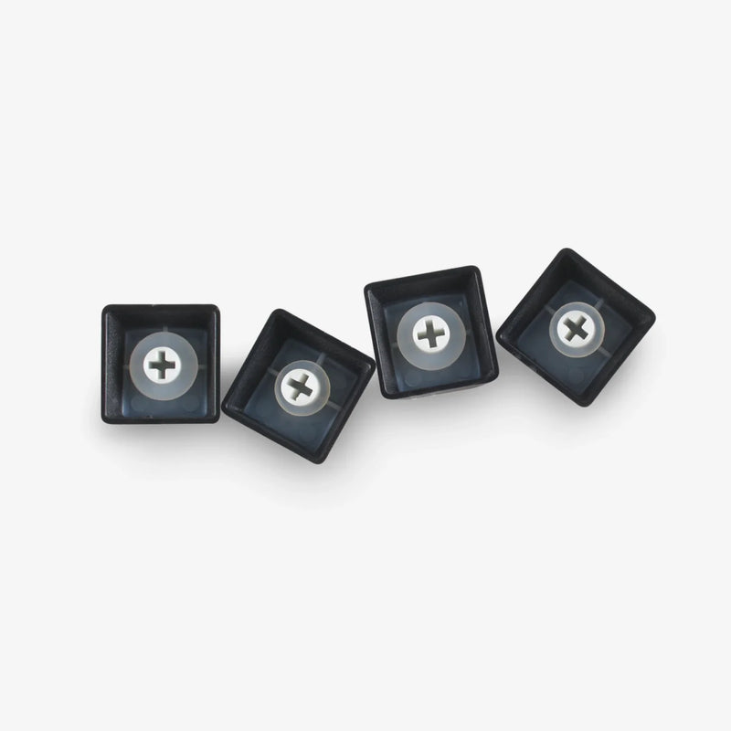 O-Ring Switch Dampeners installed on the underside of black keycaps