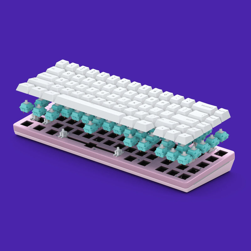 A Pink GMMK 2 65% Barebones with GPBT Arctic White Keycaps is shown in an exploded view, revealing Glorious Lynx switches beneath the keys. The background is a vibrant purple.
