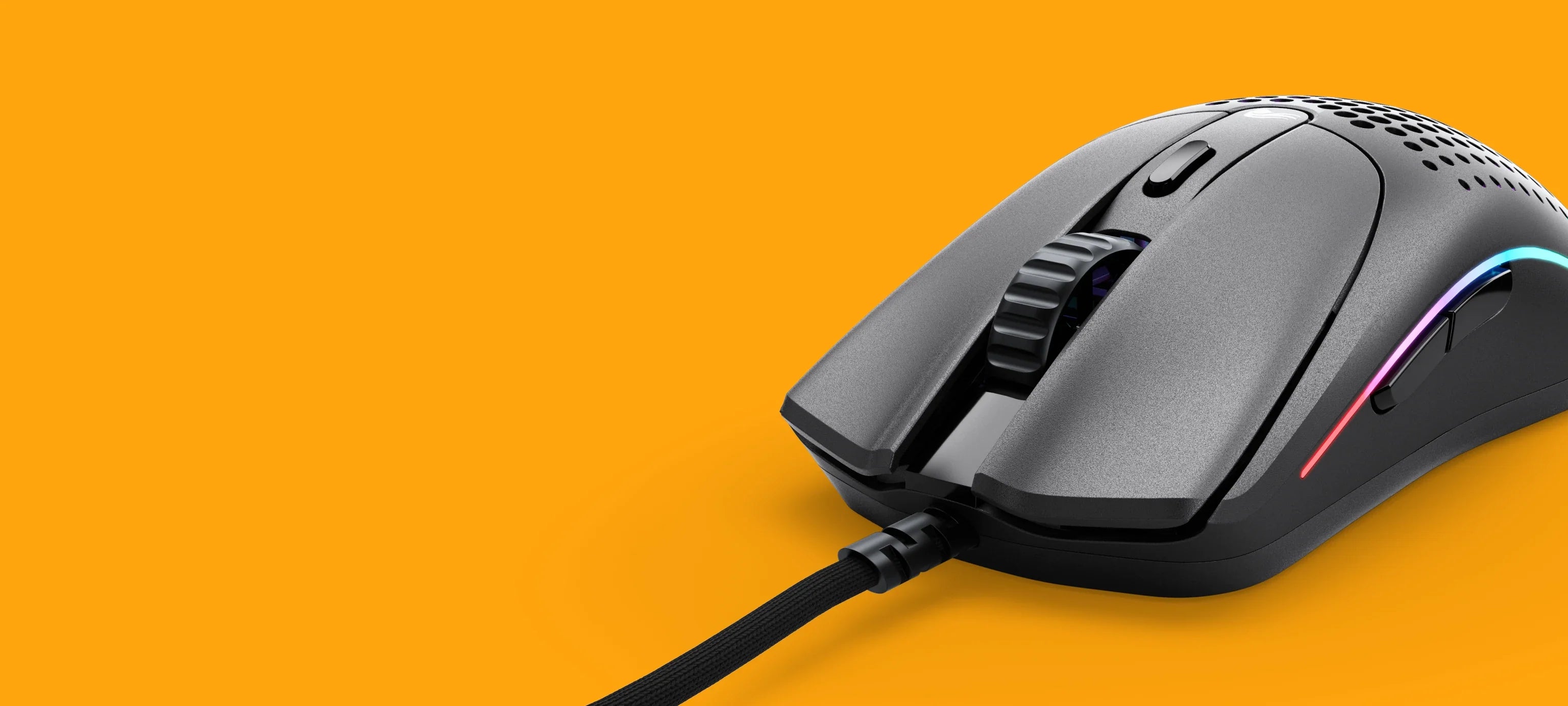 Glorious Gaming Model O 2 Wired Gaming Mouse 59g Ultralight 26,000 DPI FPS Motion Sync with 6 Programmable Buttons 19 Model O 2 Wired in Black front angle view on an orange background